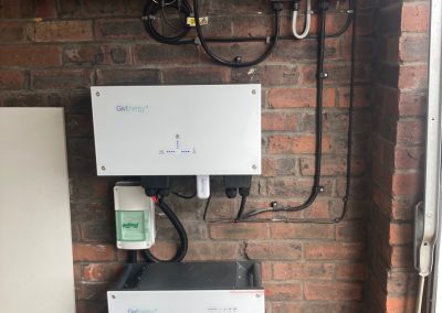 givenergy inverter and battery on a wall