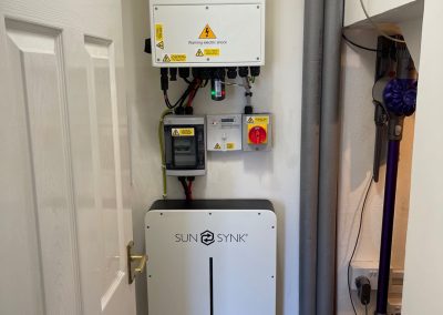 sunsynk inverter and batteries in a utility room