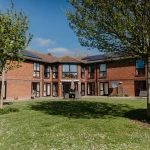 Exterior of Gorseway Nursing Home on the seafront at Hayling Island, site of an 82.3 kWp rooftop solar installation by DES Renewables